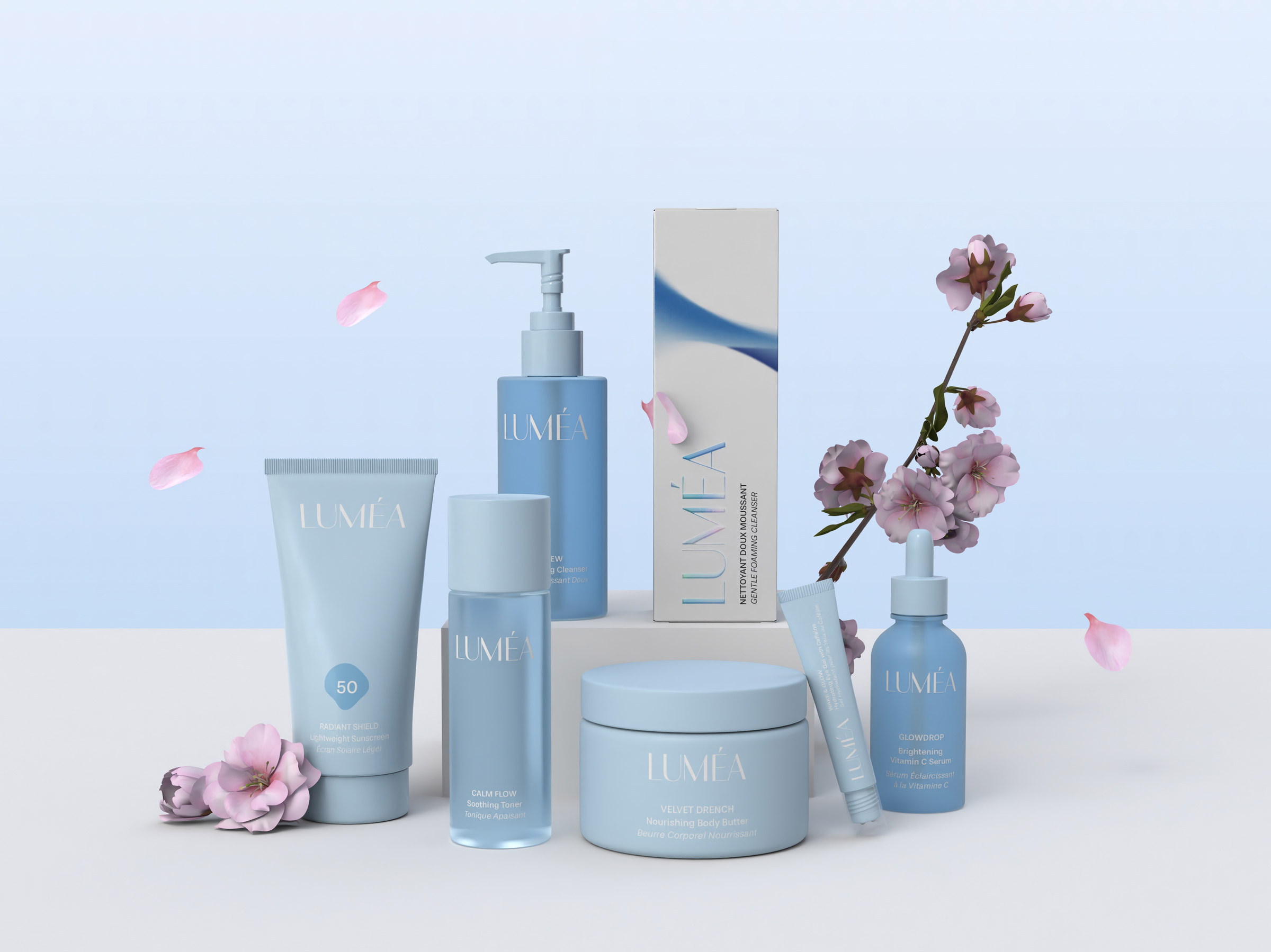 The Luméa skincare range in pale blue packaging with cherry blossom