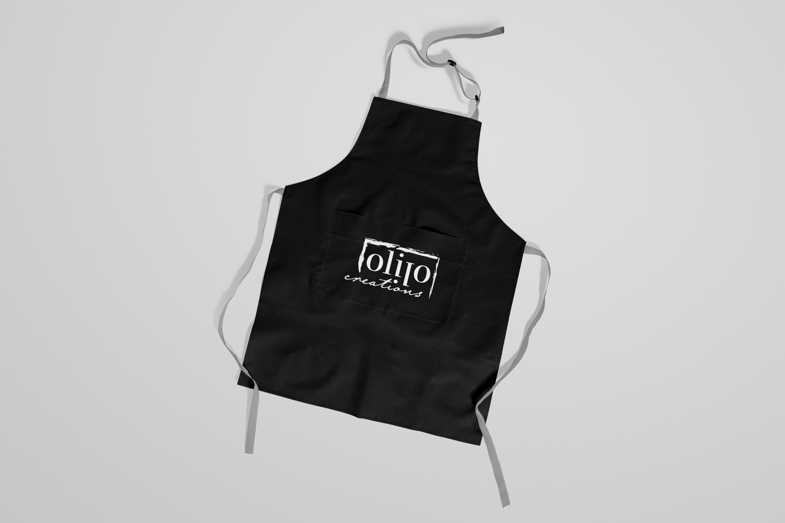 OlilO logo on a black apron