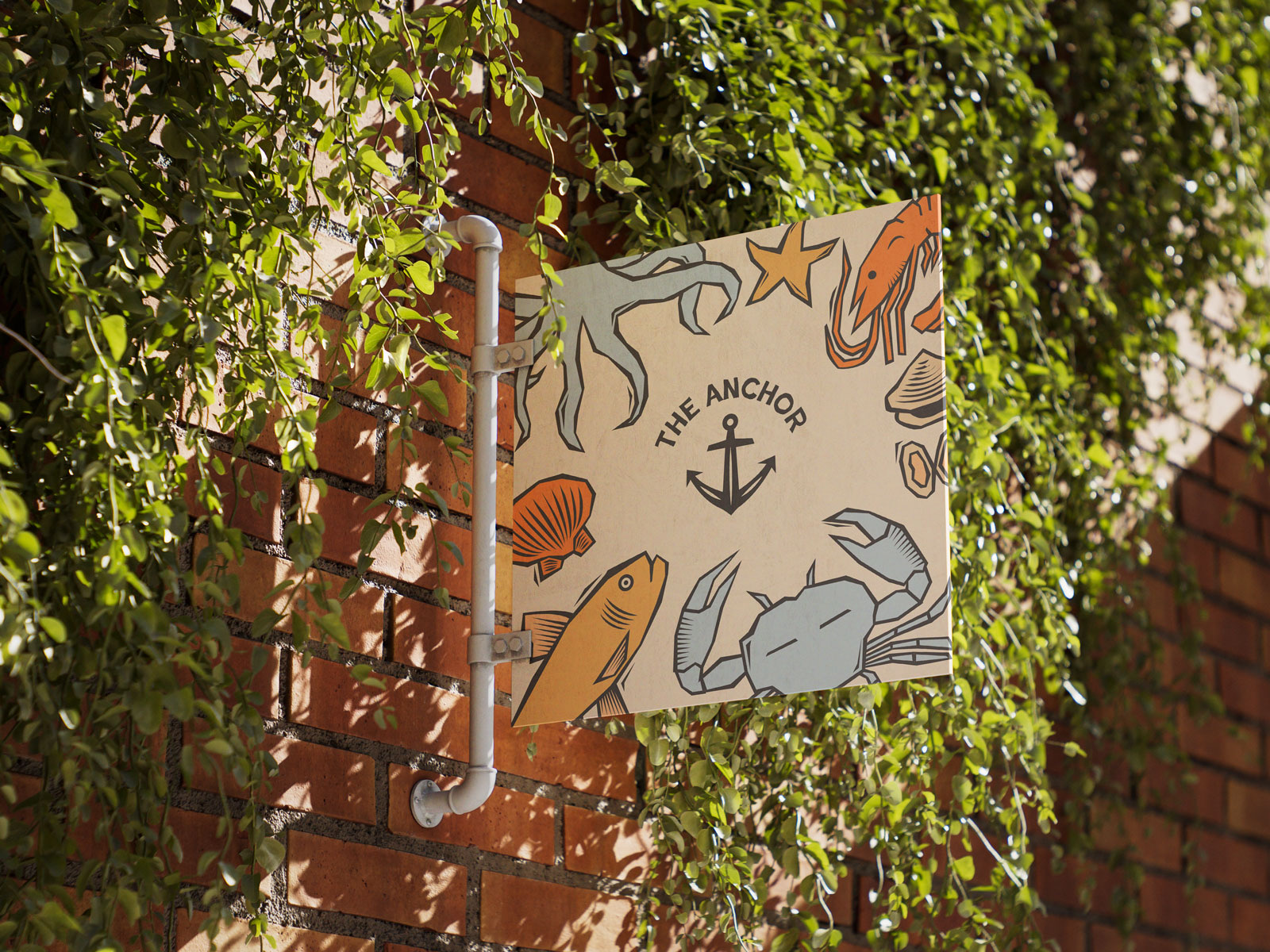 The Anchor sign with woodcut sea creature illustrations, hanging on a brick wall covered in vines